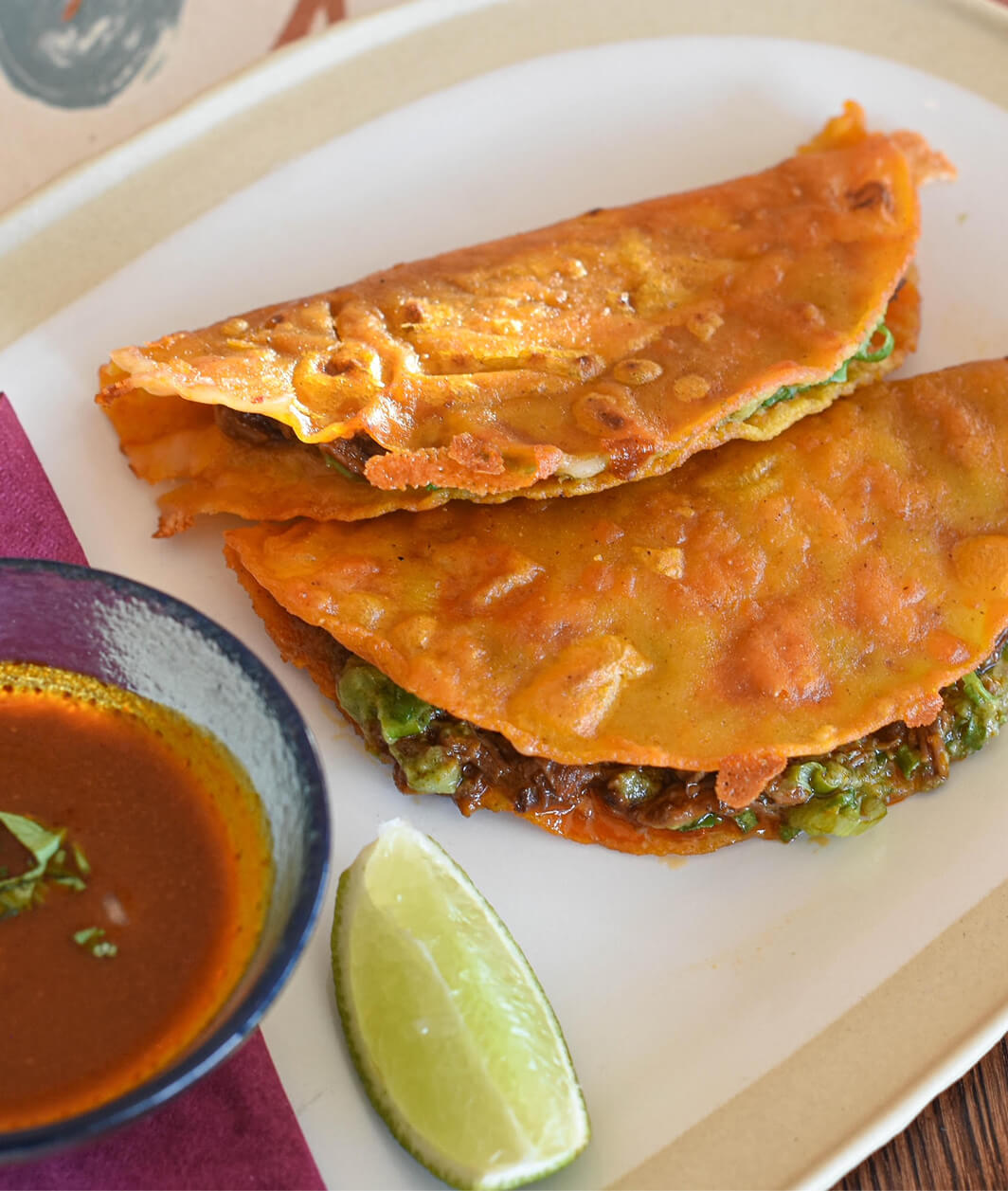 Marta's Cocina Roasted Tomato Salsa served with tacos